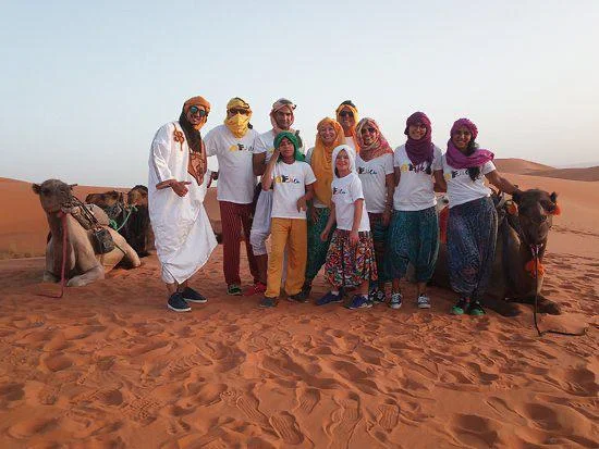 Private tour group in the dunes of Merzouga, Morocco